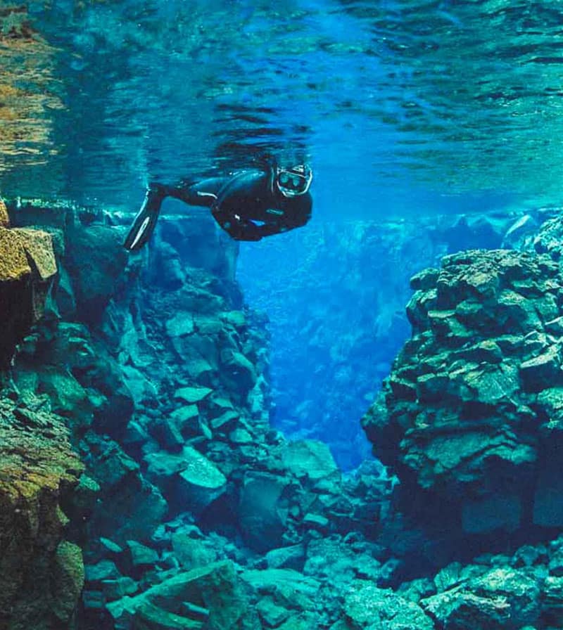 A person snorkelling in the Silfra fissure